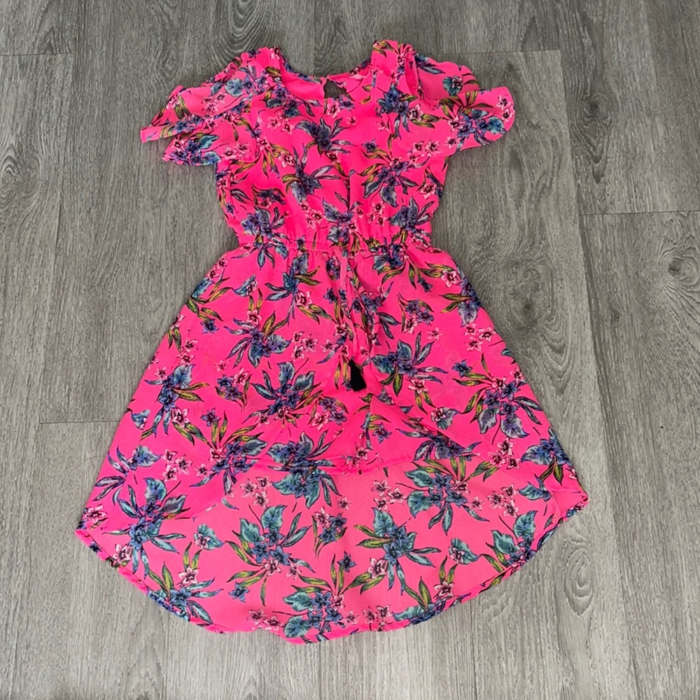 A dress from Ross.Made out of Polyester.Size 10 kids. In the color pink.
